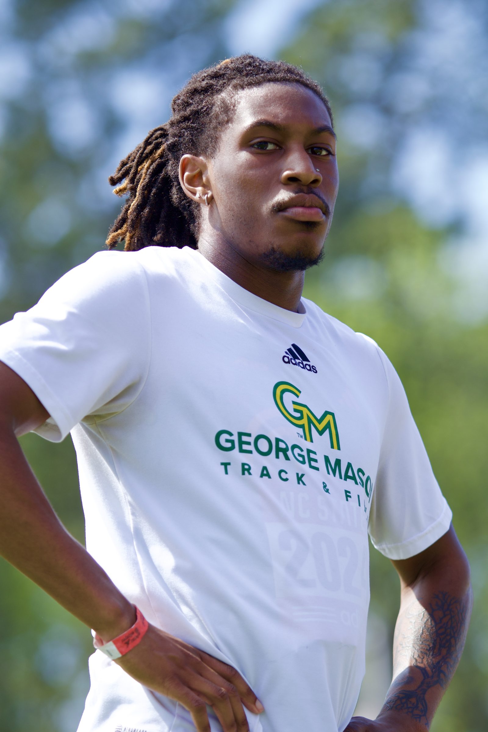 Athlete takes a moment to mentally prepare before his race. 