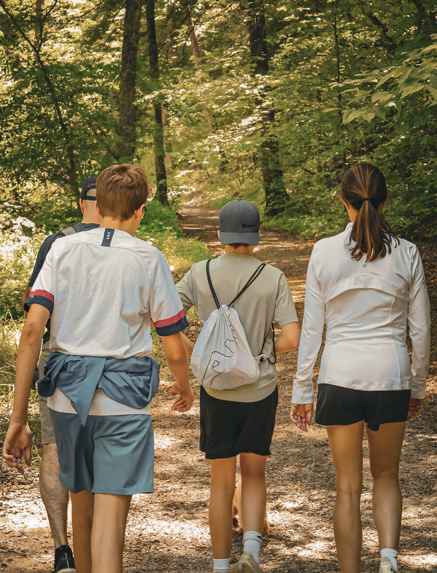 Family enjoys a hike in the late afternoon.