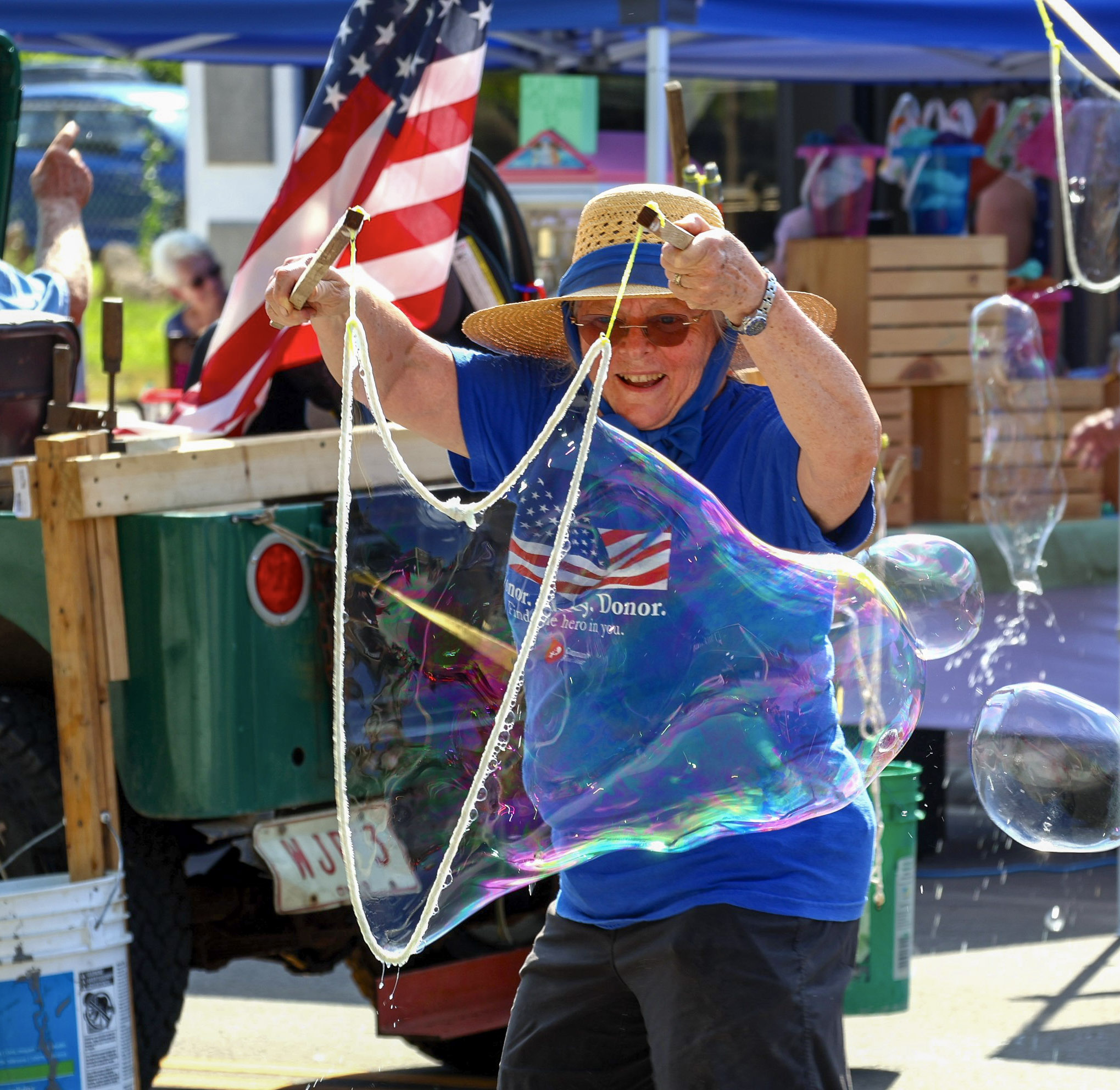 Performer shows off trick during parade.